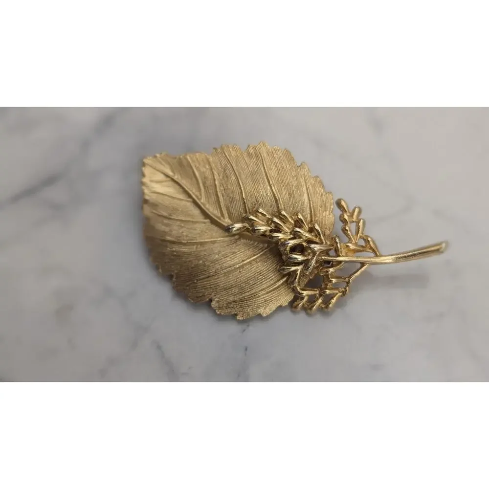 BSK Gold tone leaf brooch pin mid century elegant by Steinberg slovitt and kasko